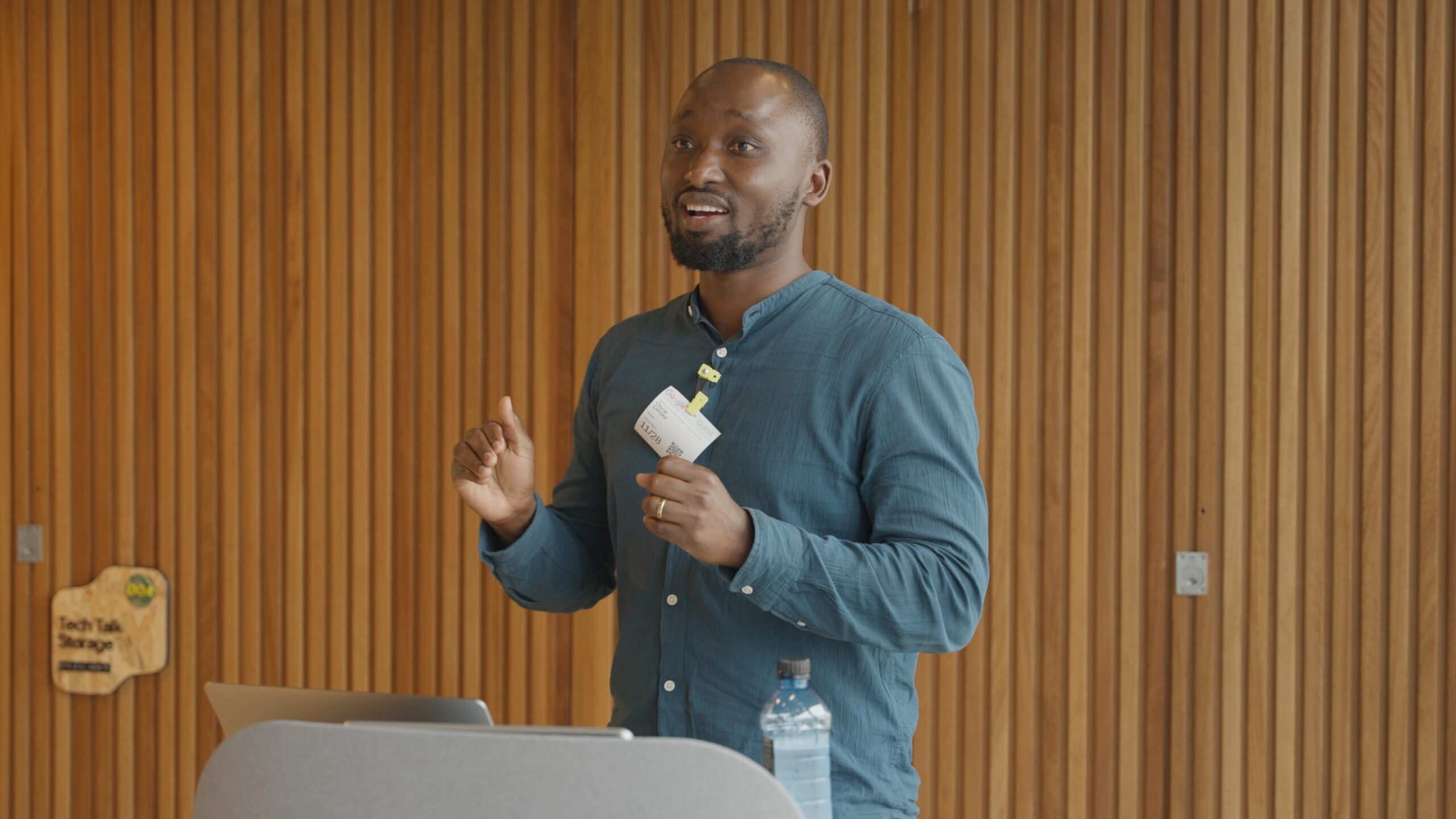 Oscar Limoke speaking at a past Cloud and AI event at Google Kenya